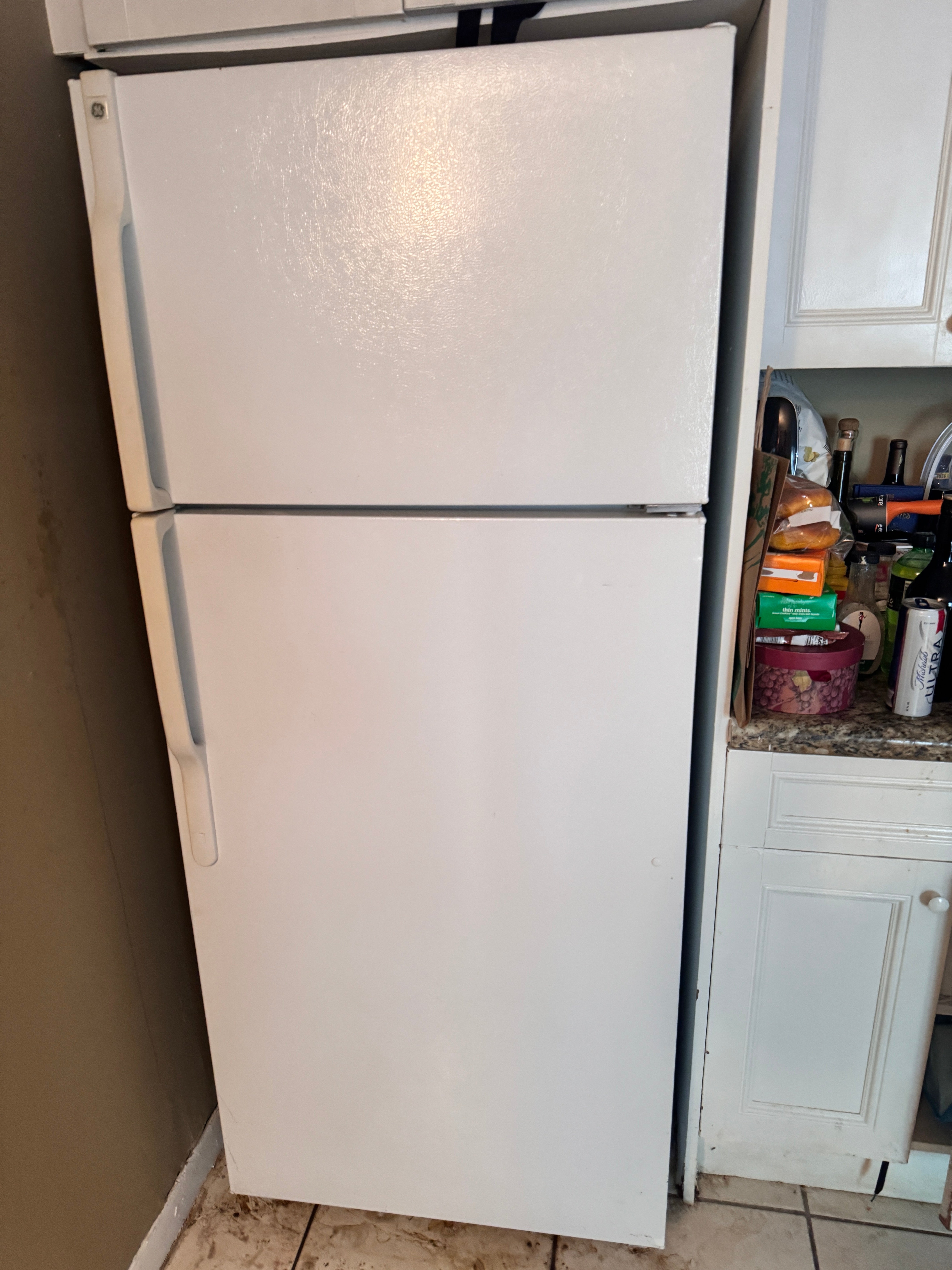 Product Sold – GE White Top and Bottom Refrigerator