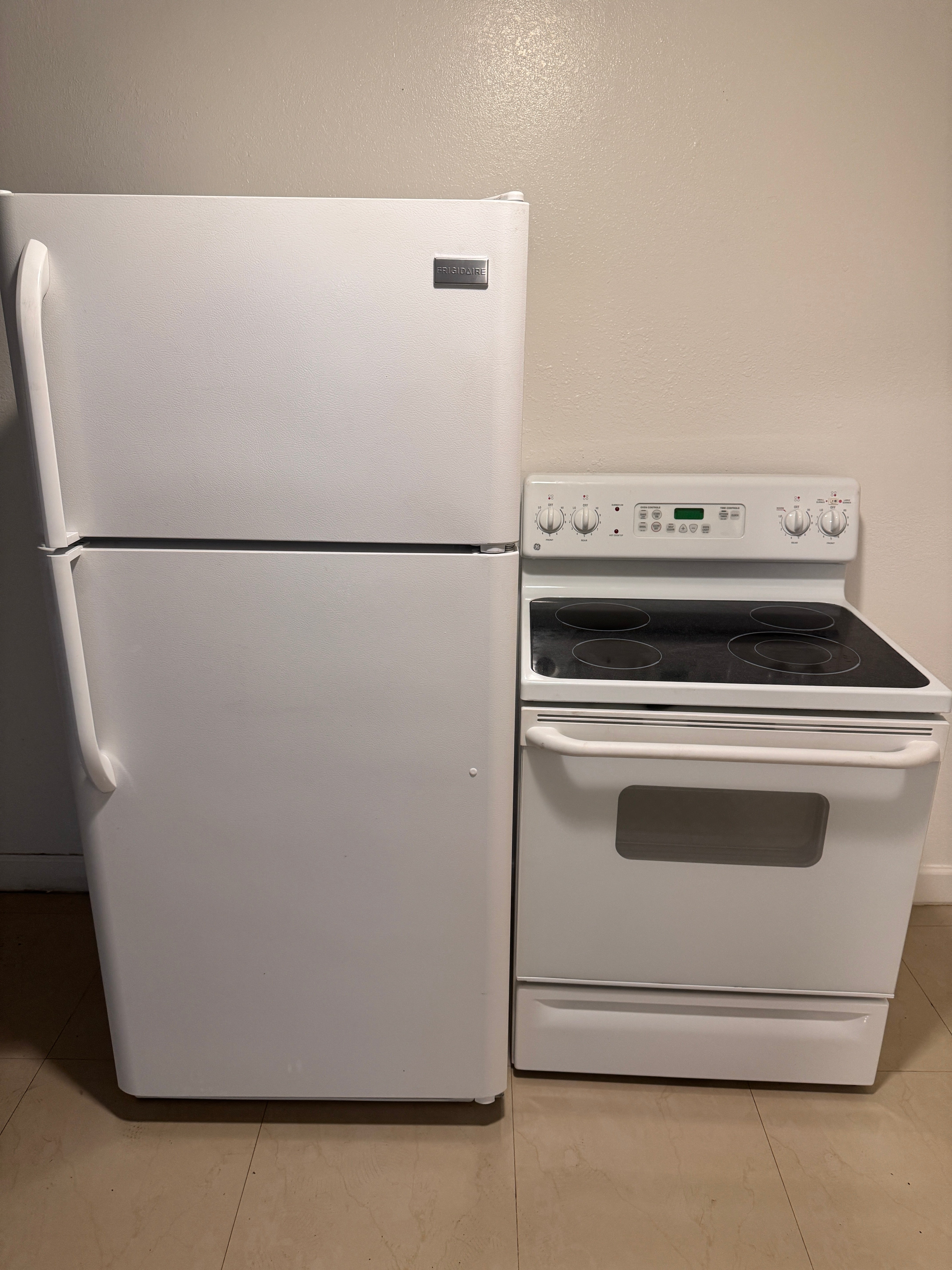 Products Sold – Frigidaire White Top and Bottom Refrigerator + GE White Electric Stove