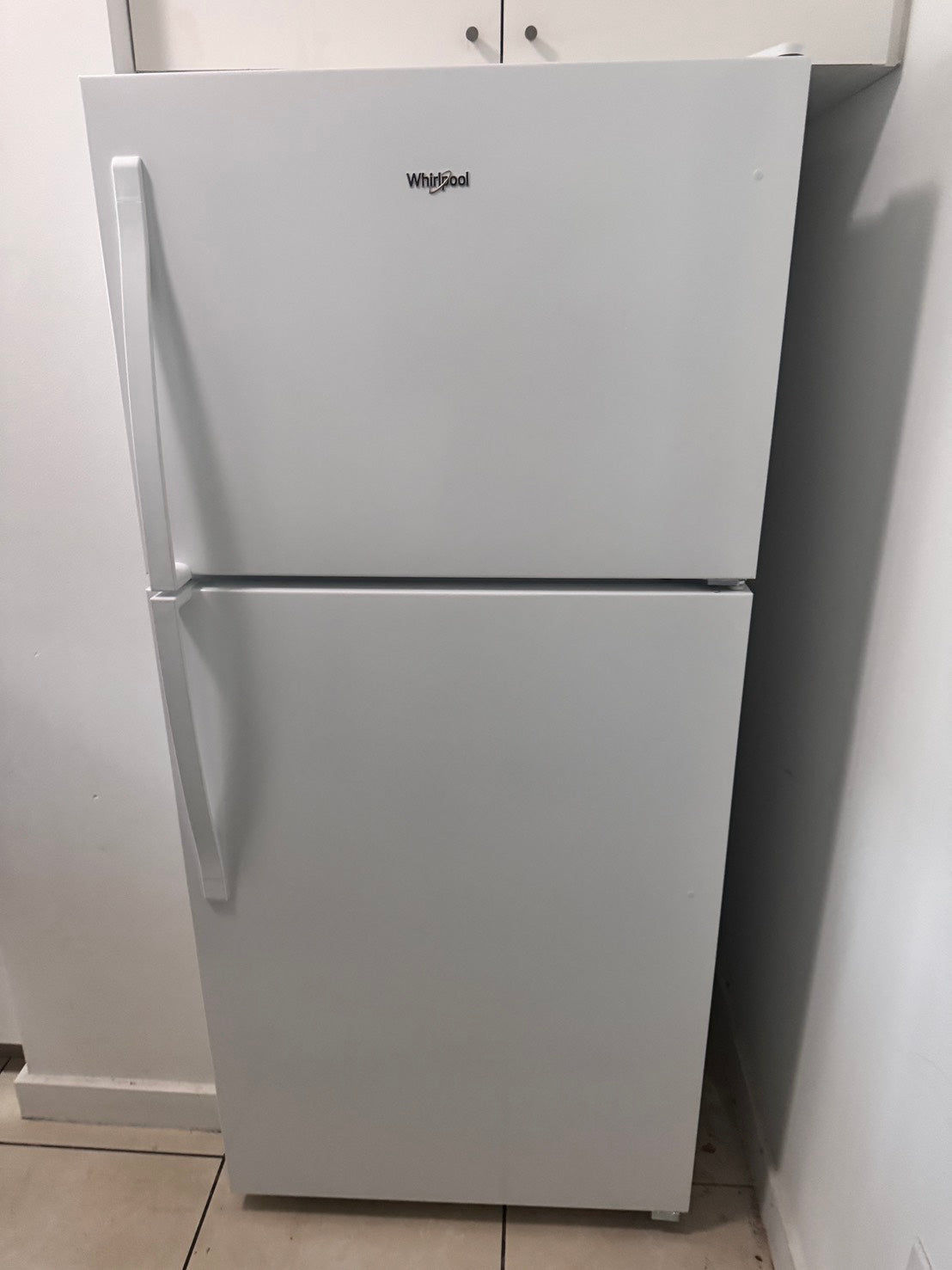 Product Sold – Whirlpool White Top and Bottom Refrigerator