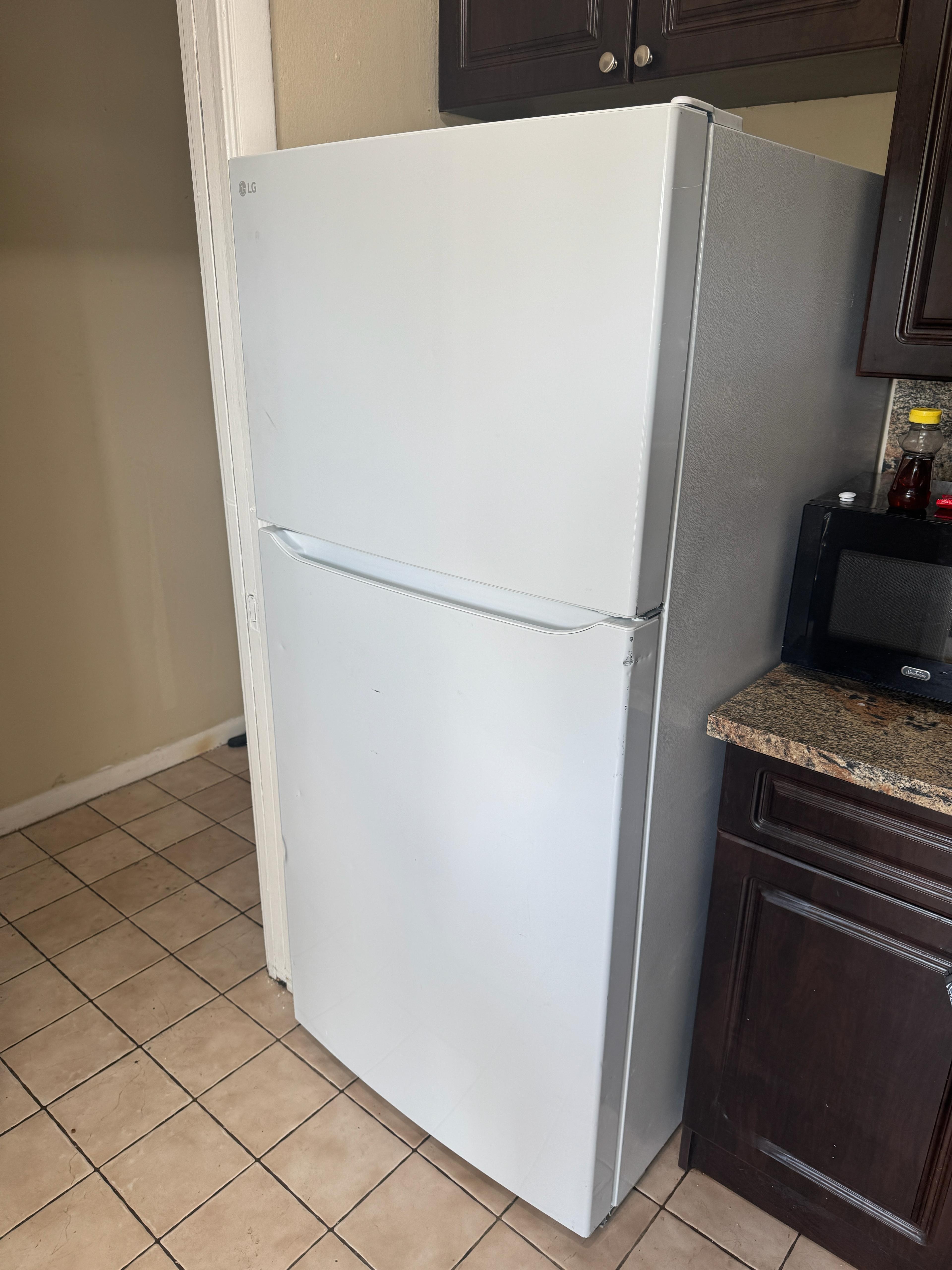 Product Sold – LG White Top and Bottom Refrigerator