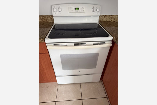 Product Installed – White Electric Stove + White Dishwasher