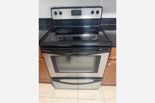 Product Installed – Black Electric Stove + SS Microwave