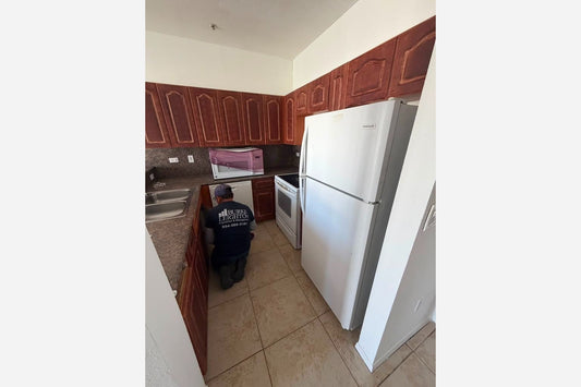 Product Installed – White top and Bottom Refrigerator + White Electric Stove + White Microwave