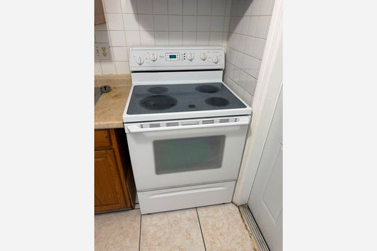 White Electric Stove installed in Sunrise, FL 33313