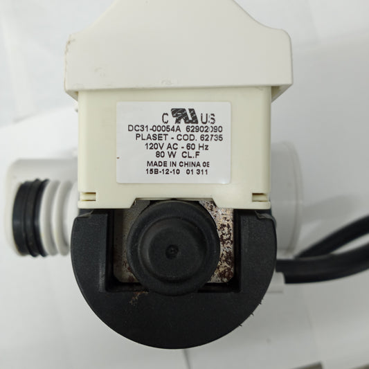 Samsung washer drain pump motor, model number DC31-00054A, with visible signs of wear and brand markings.
