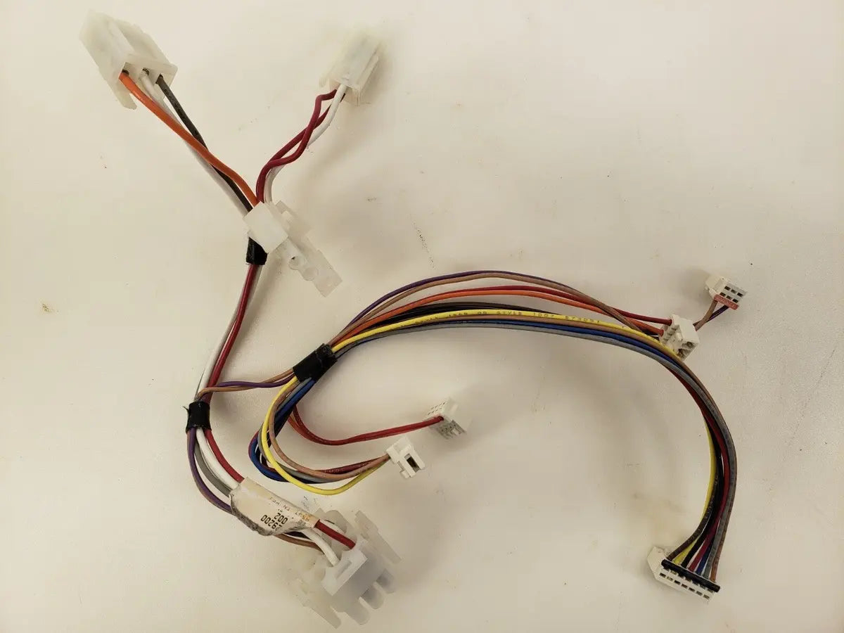 A washer/dryer wiring harness with multiple colored wires and connectors